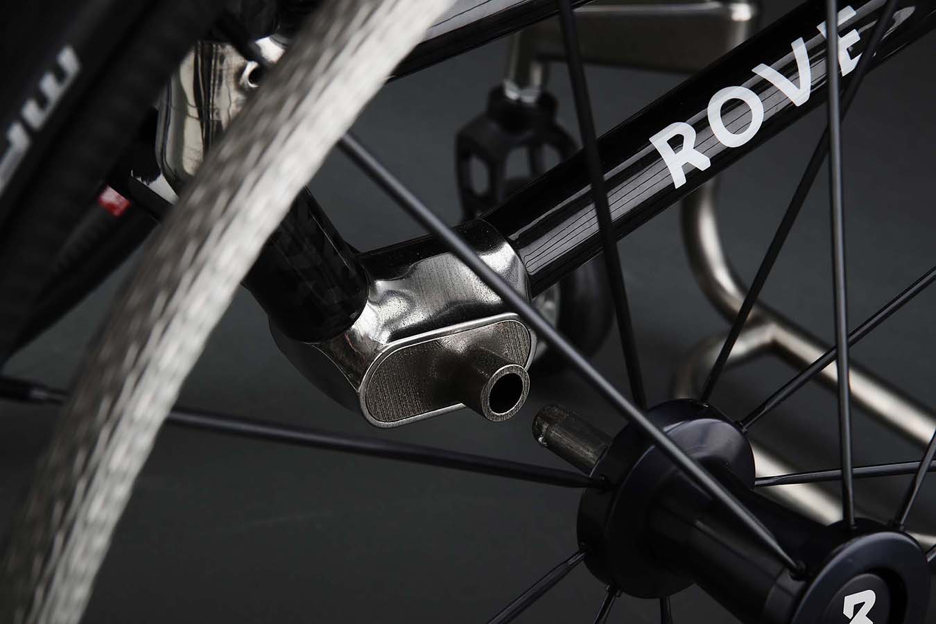 A detail image of Rove Wheelchair patented 'FlipChip' axle adjustment feature.