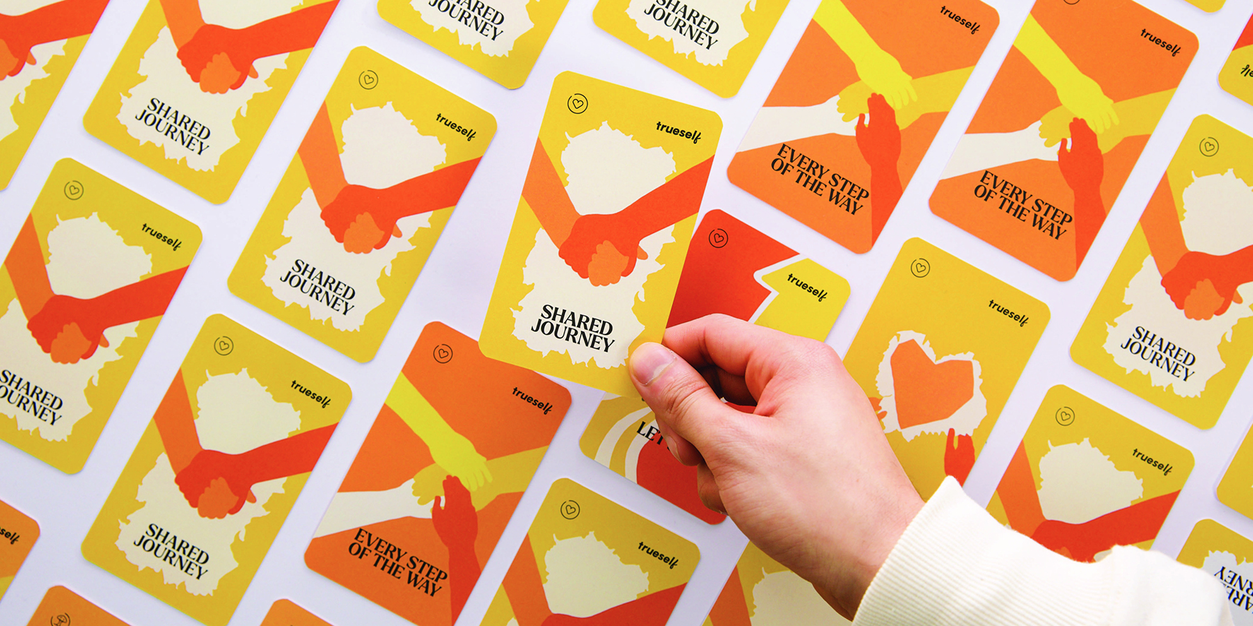 Physical toolkit game cards with interactive prompts and activities designed to support communication and connection.