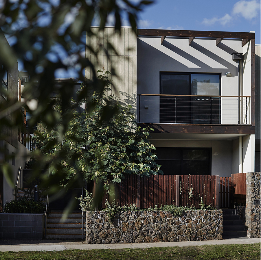 A two-story terrace house. Guy Lavoipierre