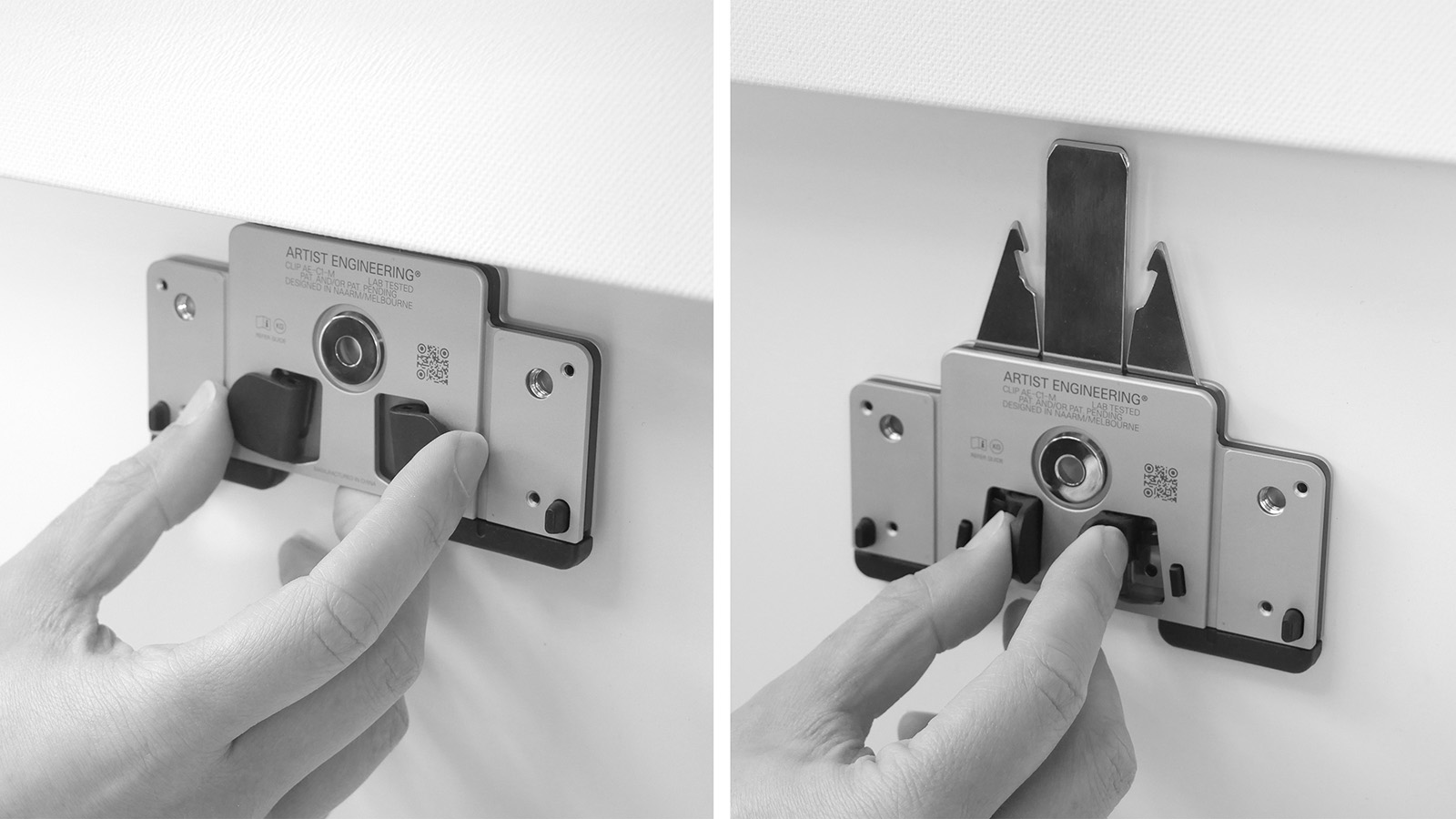 A user unlocking triggers, then actuating the safety latches to disengage an AE clip from bracket/artwork