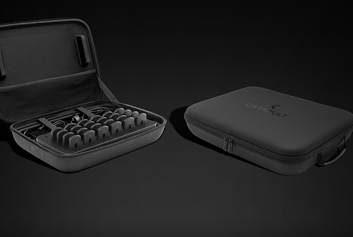A product studio shot of multiple T7 Devices loaded into the dock, which is loaded into the carry case.