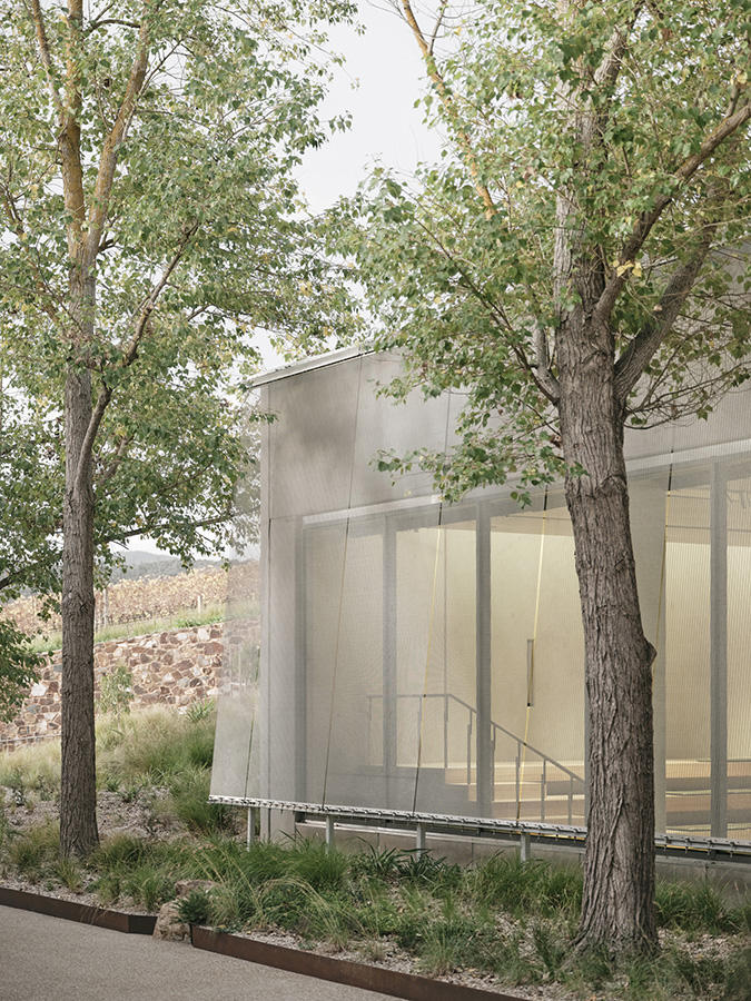 Woven metal veil maintains views and natural light