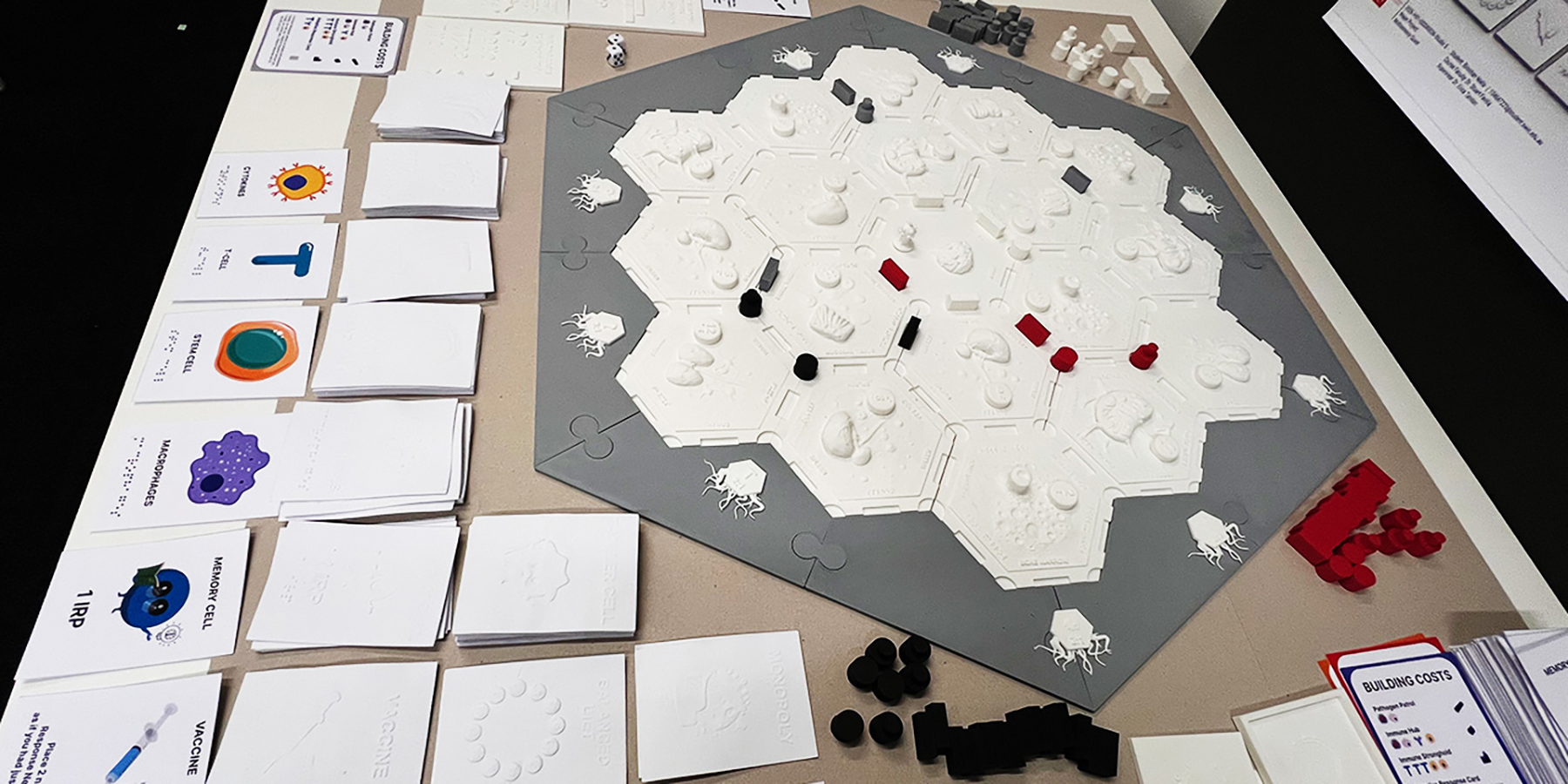 Game ready for play-testing sessions complete with embossed textured cards