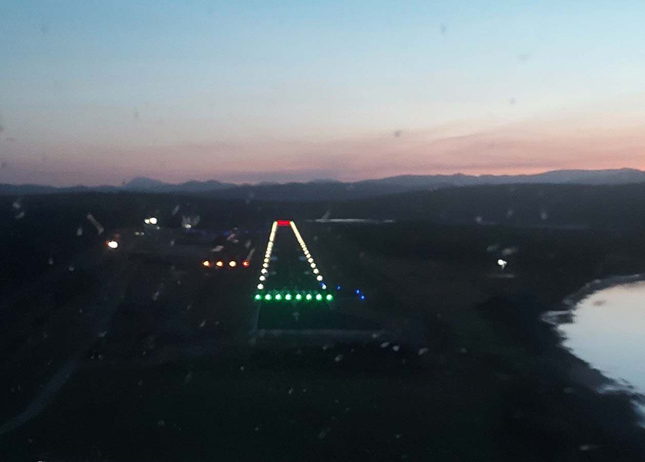 Aerolight runway lights from the air approaching runway.