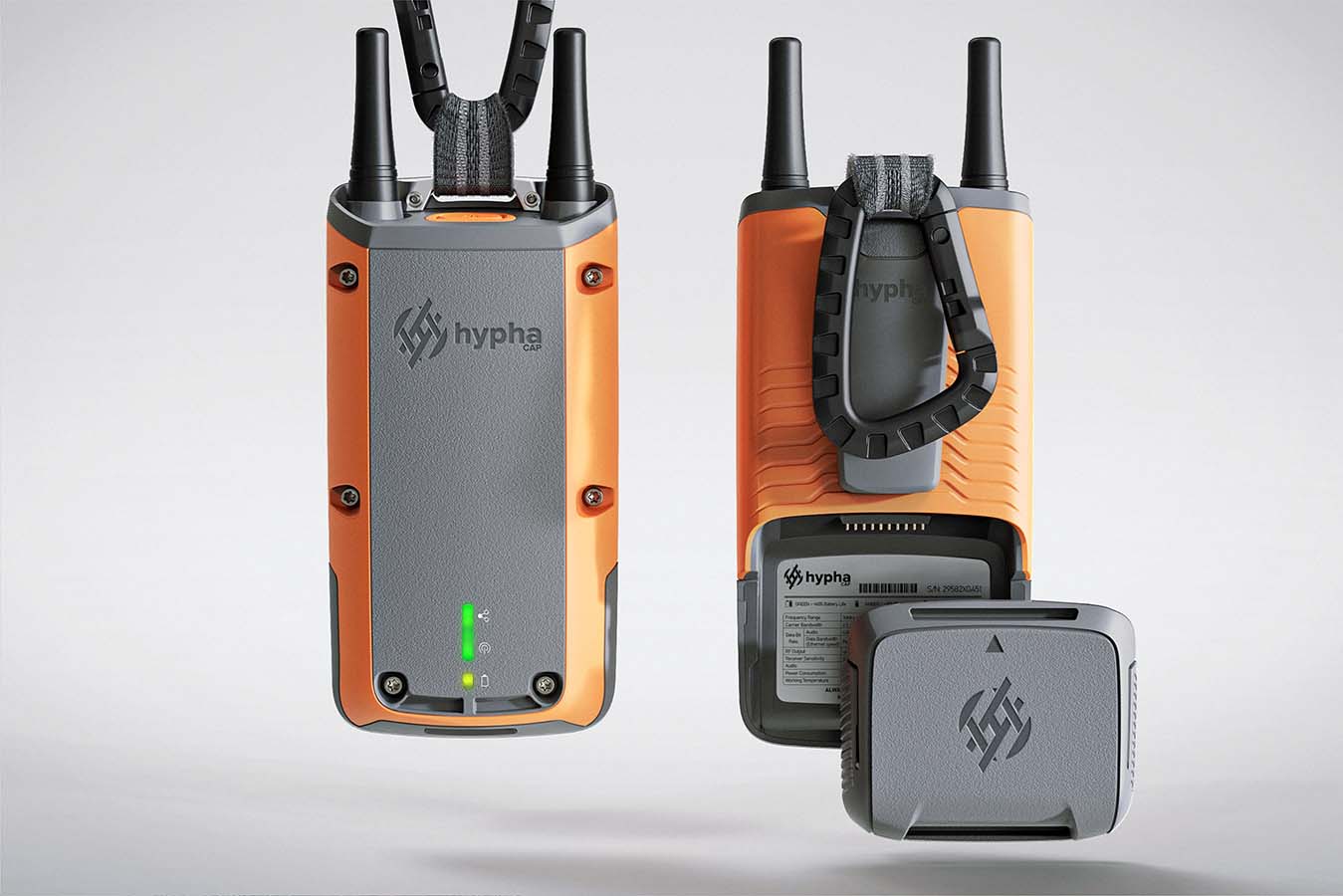 A product studio shot of the HyphaCAP device, Front + Back, Demonstrating battery removal.