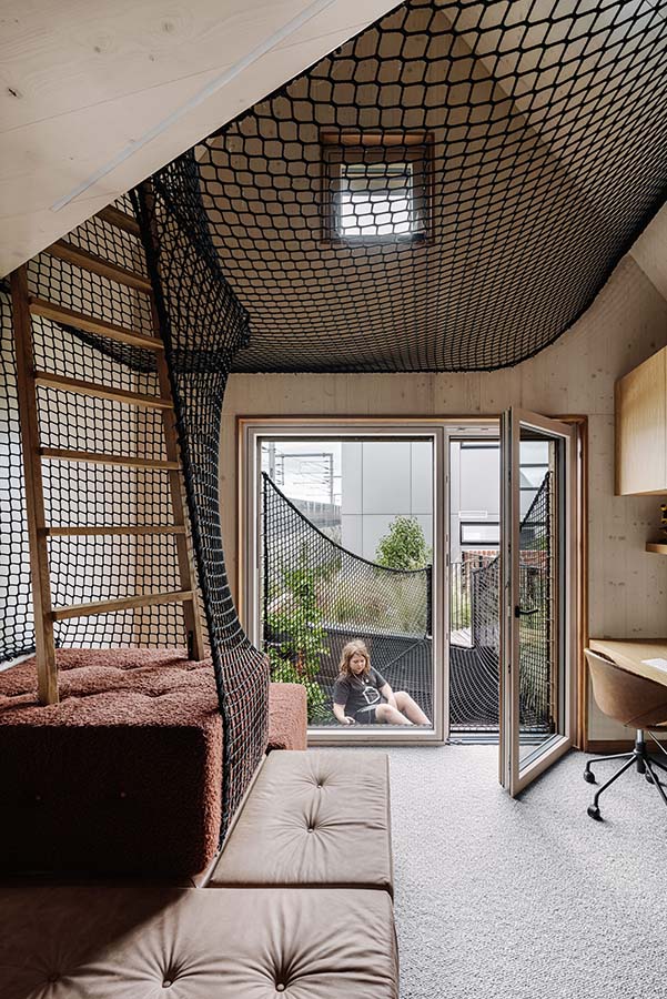 Kids room with hammock style nets and adventurous bridge to green roof. Photo by Marnie Hawson