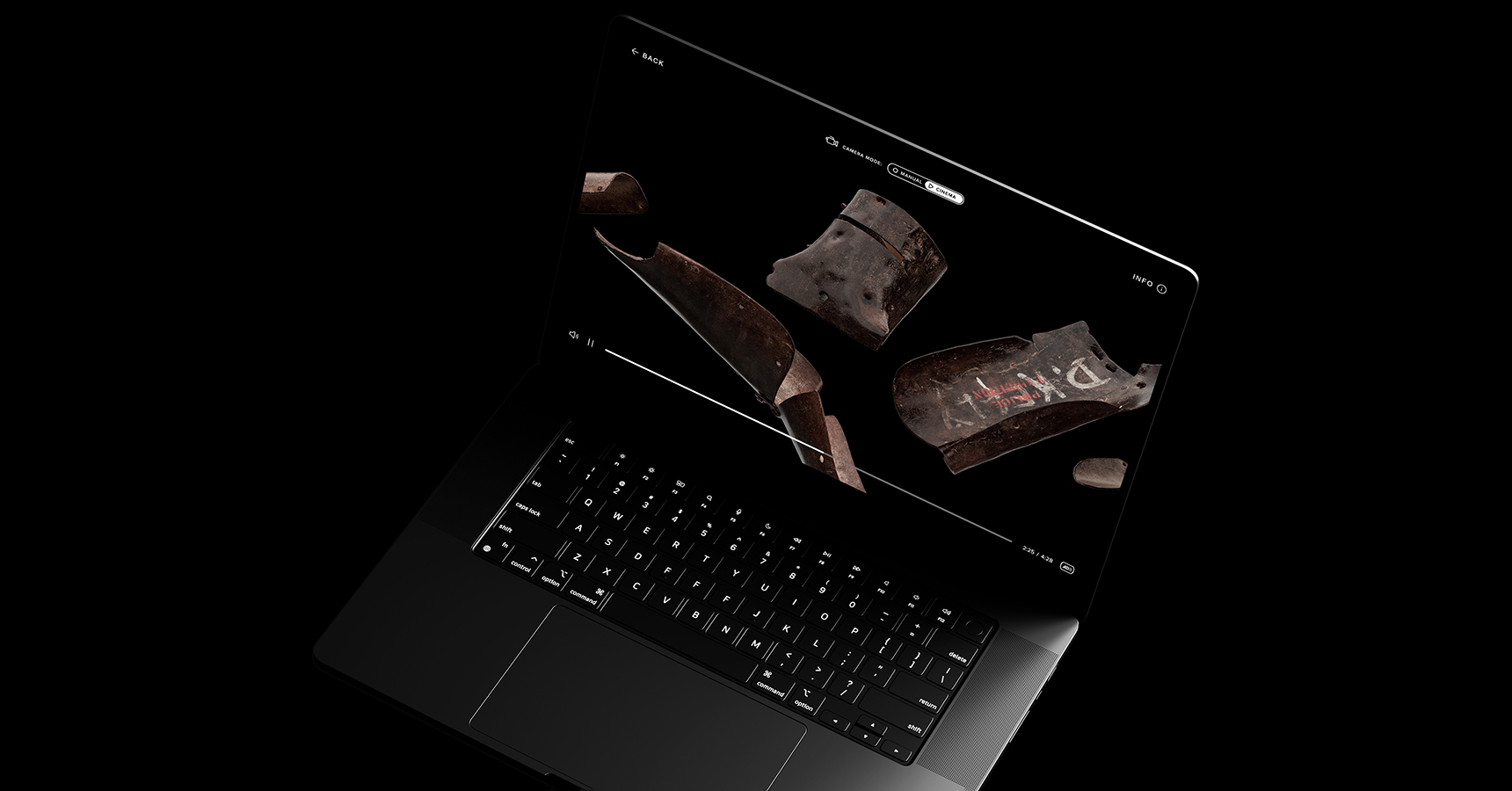 A laptop on black displaying Ned Kelly's armour on the screen
