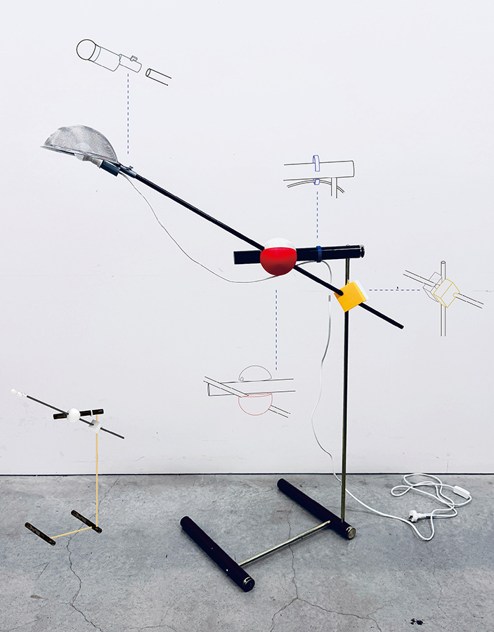 A floor lamp built from salvaged materials with visible 3D-printed joints, highlighting part variation and connection details