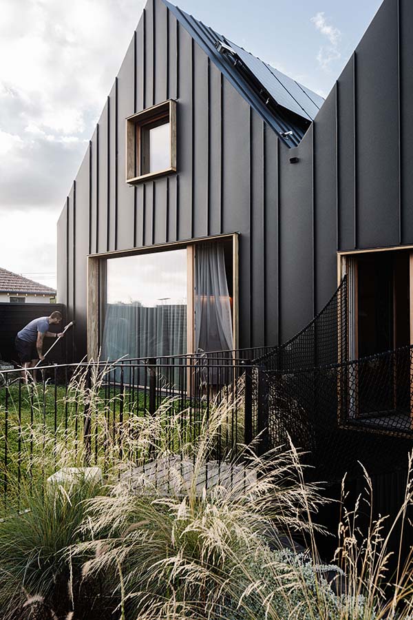 Private Green Roof Garden with contemporary black house behind. Photo by Marnie Hawson