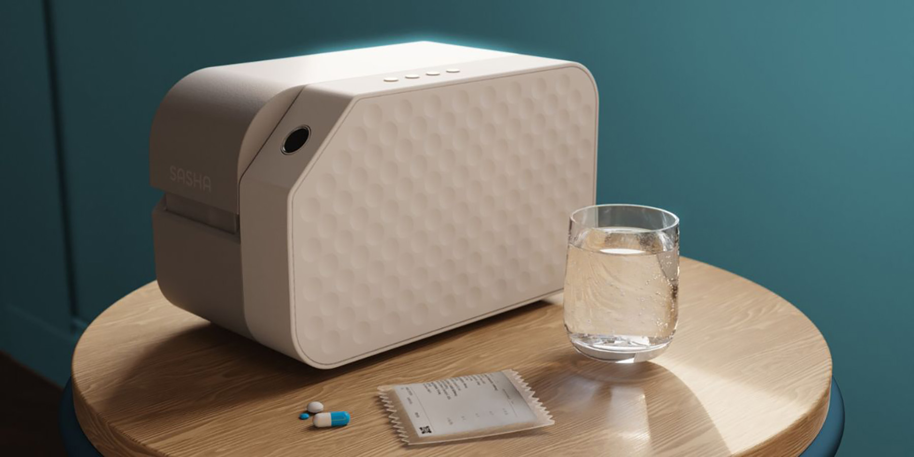 Small medication management device sitting on a side table next to a medication sachet, pills, and a glass of water.