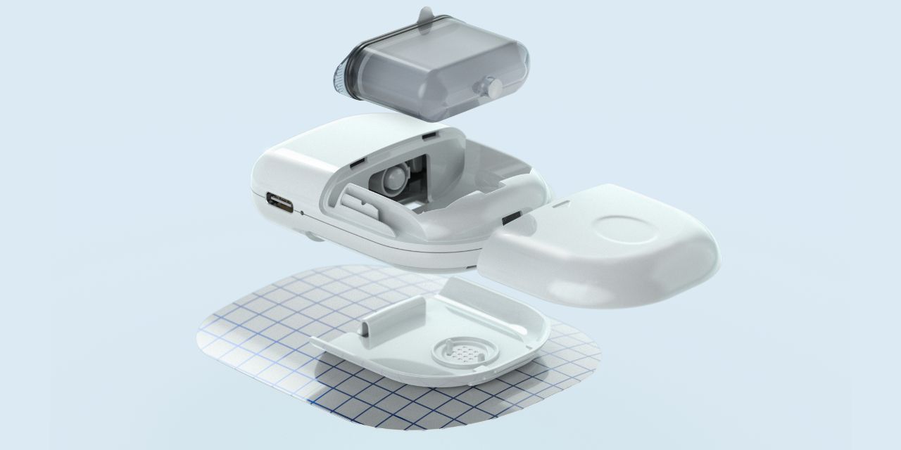 Breakdown of replaceable components with the microneedle plate in the bottom, device in the centre and reservoir in the top