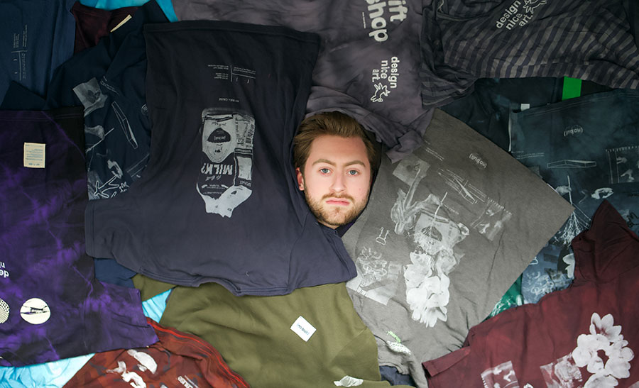 Felix Toohey Buried in T shirts.