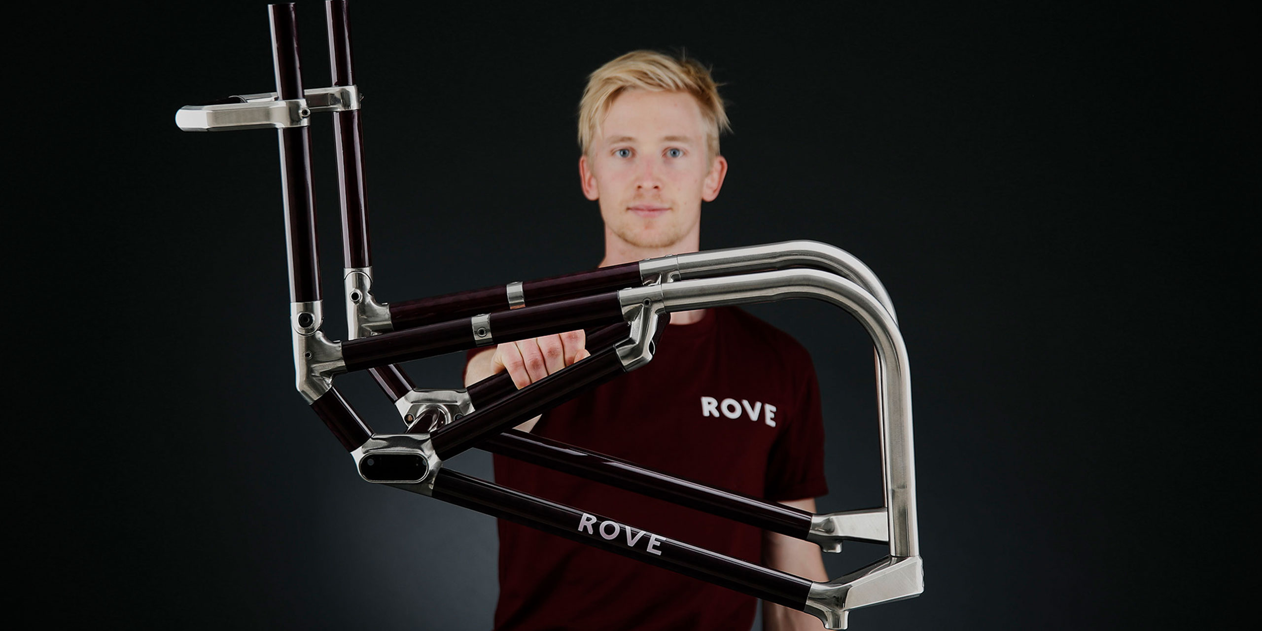 Ryan Tilley, Rove Managing Director and Design Engineer holding Rove Wheelchair frame.