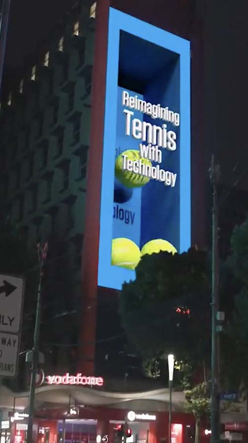 Spectator using 3D glasses following the tennis ball. Visualised on a 236 sqm 3D billboard on Bourke st and Swanston st.