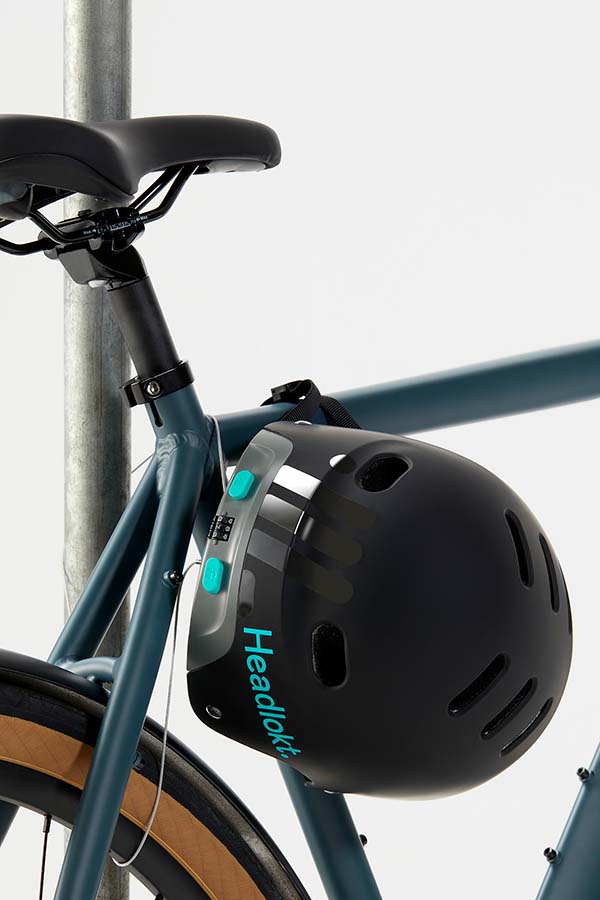 Headlokt OneLock helmet locking a bicycle to a pole
