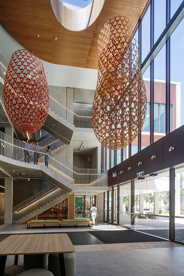 Kangan Institute Health and Community Centre of Excellence foyer with hanging bilangs