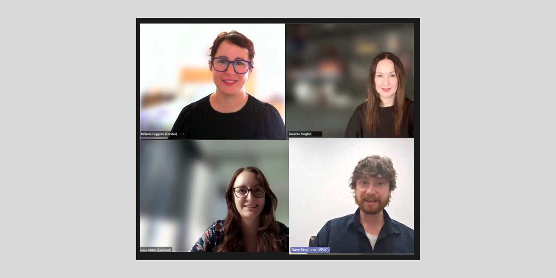 Four people in a meeting