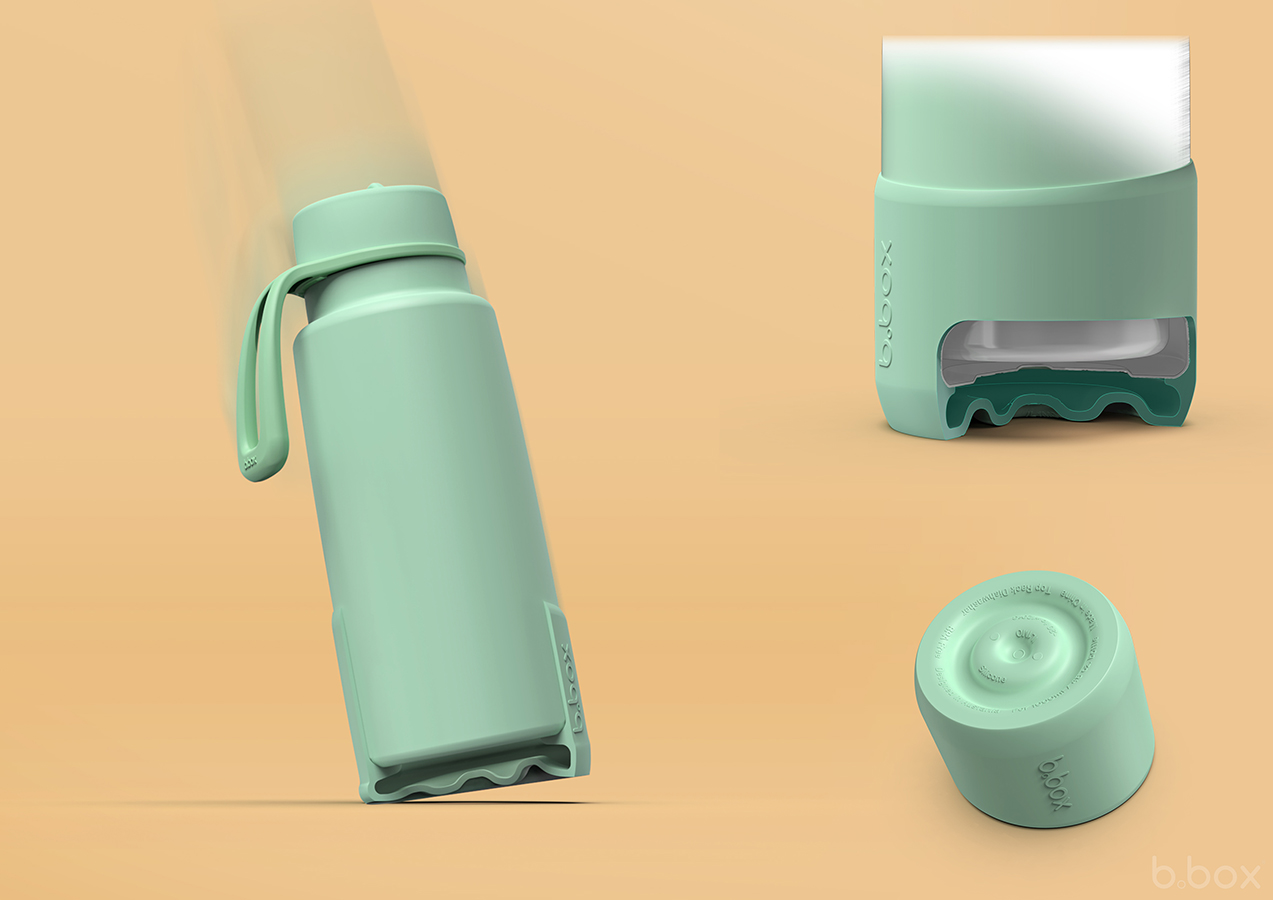 Green b.box bottle with silicone bumper sleeve shown mid-impact, cutaway reveals shock-absorbing base on beige background.