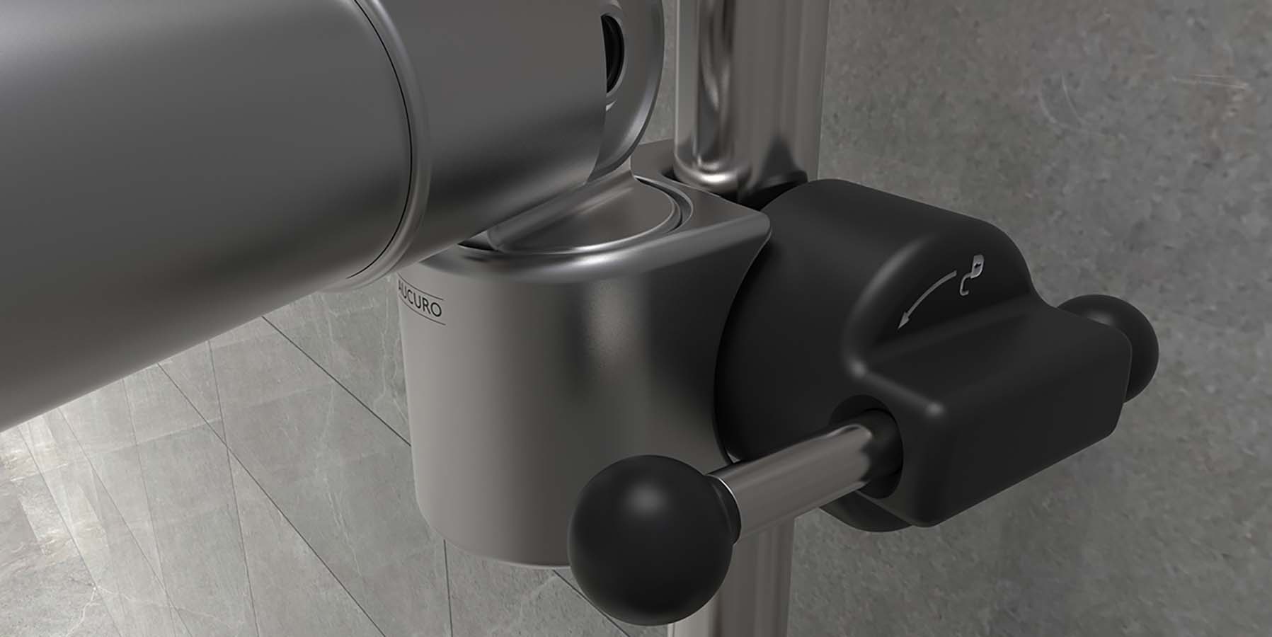 closeup of the clamping system of the telescopic shower holder attached to a grab rail with a lever extending from the clamp