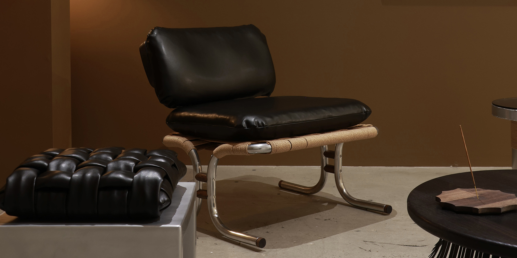 Nopal Lounger by Locki Humphrey; easy chair with an aluminium tube frame, woven paper cord, timber accents & leather cushions